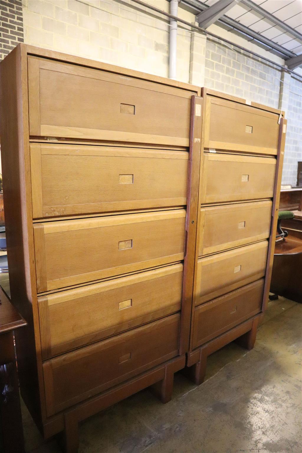 A pair of mid century RAF Staverton oak bookcases, both stencil marked to backs